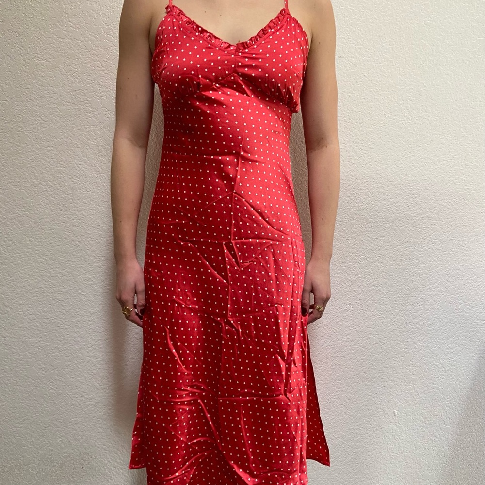 Red and white polka dot slip dress with slit
